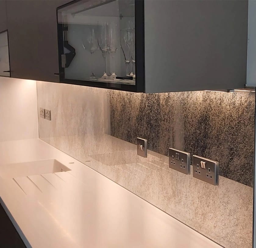 Antique mirror above kitchen countertop