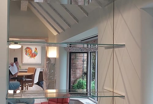 Glass shelving with mirror back