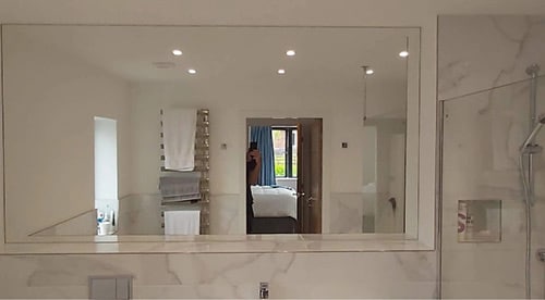 bathroom mirror with white frame