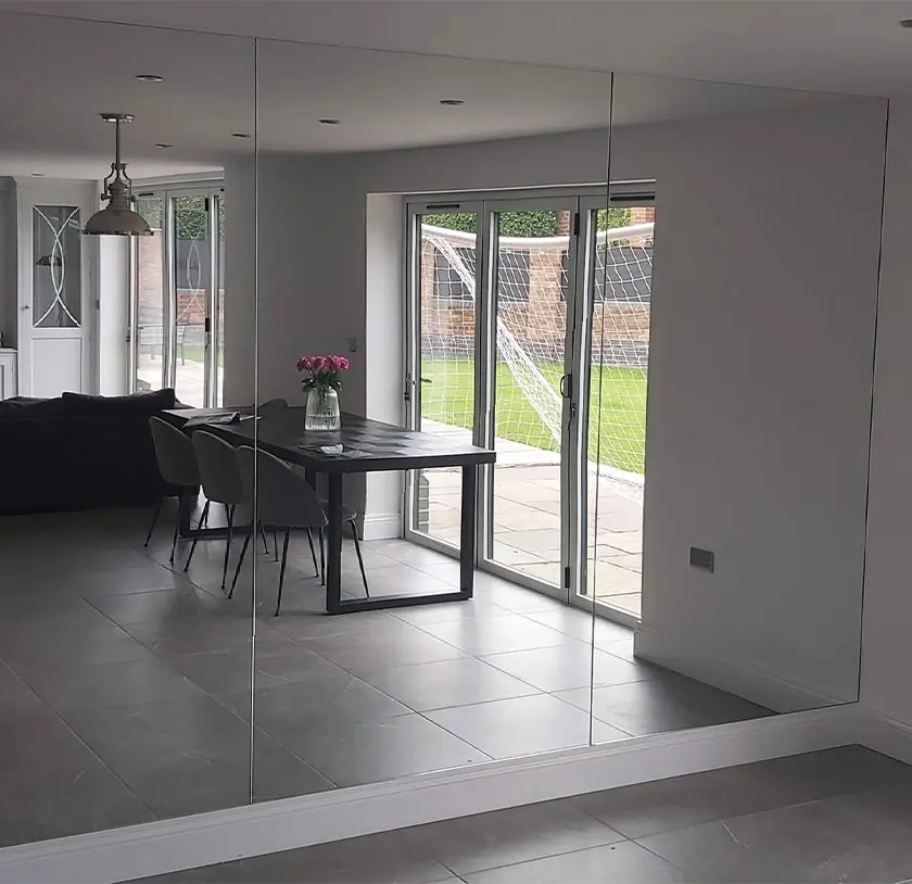 Row of floor to ceiling mirrors