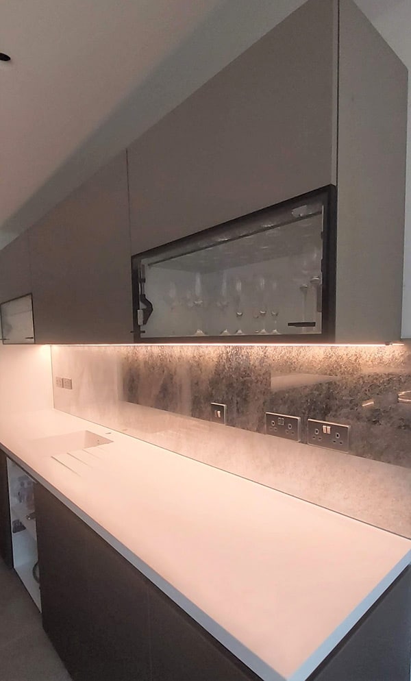 Antique mirror above kitchen countertop