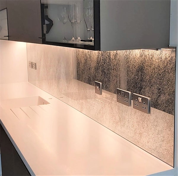 Antique mirror above kitchen countertop