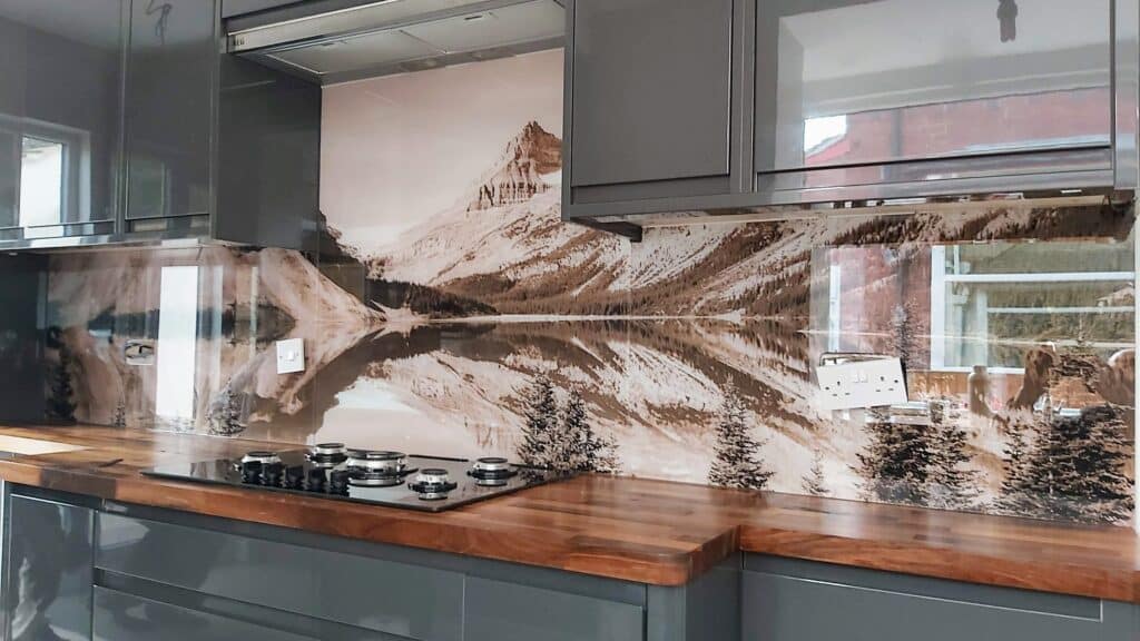 Printed glass splashback of a snowy mountain scene